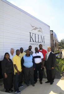 Dr. Joyce Jenkins, dean of the Raymond Campus Career-Technical Education division, left, and Dr. Chad Stocks, assistant dean, far right, pose with the first class of KLLM and Hinds students in 2013.