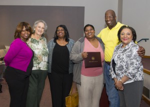 Ashley Louis of Jackson is the winner of the annual Carla McCulloch Scholarship for nursing students at Hinds Community College. From left are Rosalind Ratcliff, Hinds clinical instructor; Dene Bass-Cook, retired Hinds instructor who presented the scholarship; Louis' mother, Margie Davis; Ashley Louis, her husband Charles Buck; and Dr. Irish Patrick-Williams, Hinds instructor.