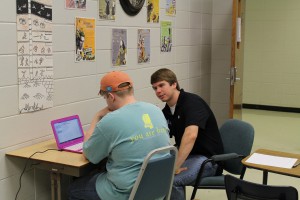 Freshman Cameron Furey, left, is assisted in his class selection and registration by Associated Student Government representative Joshua Masterson.
