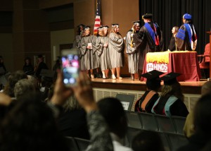 Students who graduated with honors receive cords before proceeding across the Muse Center stage during Hinds Community College graduation ceremonies on Dec. 16. Among the graduates, nine achieved summa cum laude, a 4.0 grade point average; 46 achieved magna cum laude, 3.6 to 3.99 GPA and 110 achieved cum laude, 3.2 to 3.59.